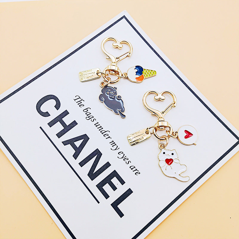 Llavero de flores de gatito de aleación de zinc al por mayor