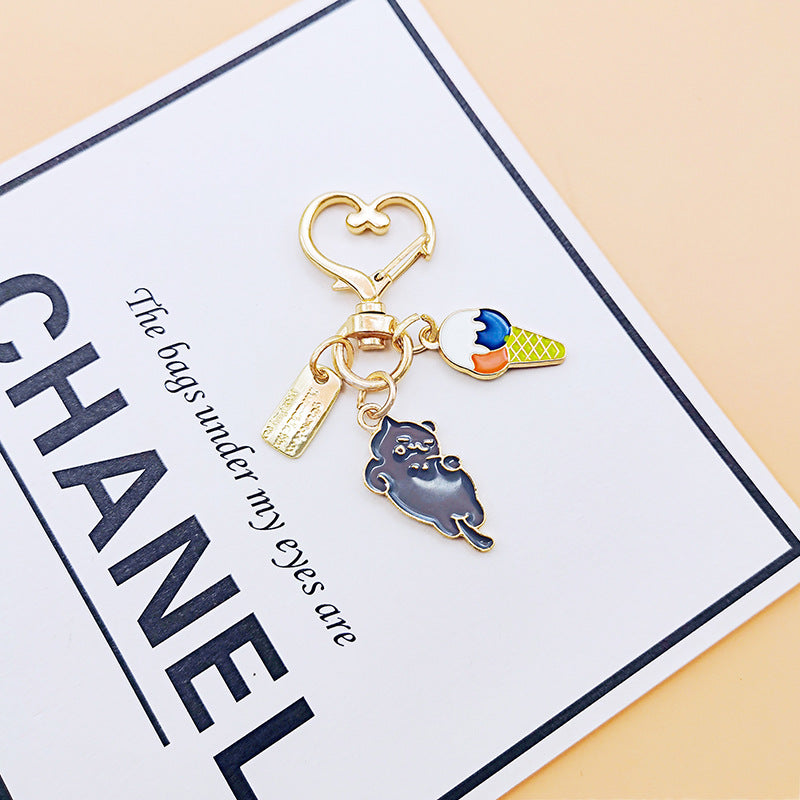 Llavero de flores de gatito de aleación de zinc al por mayor