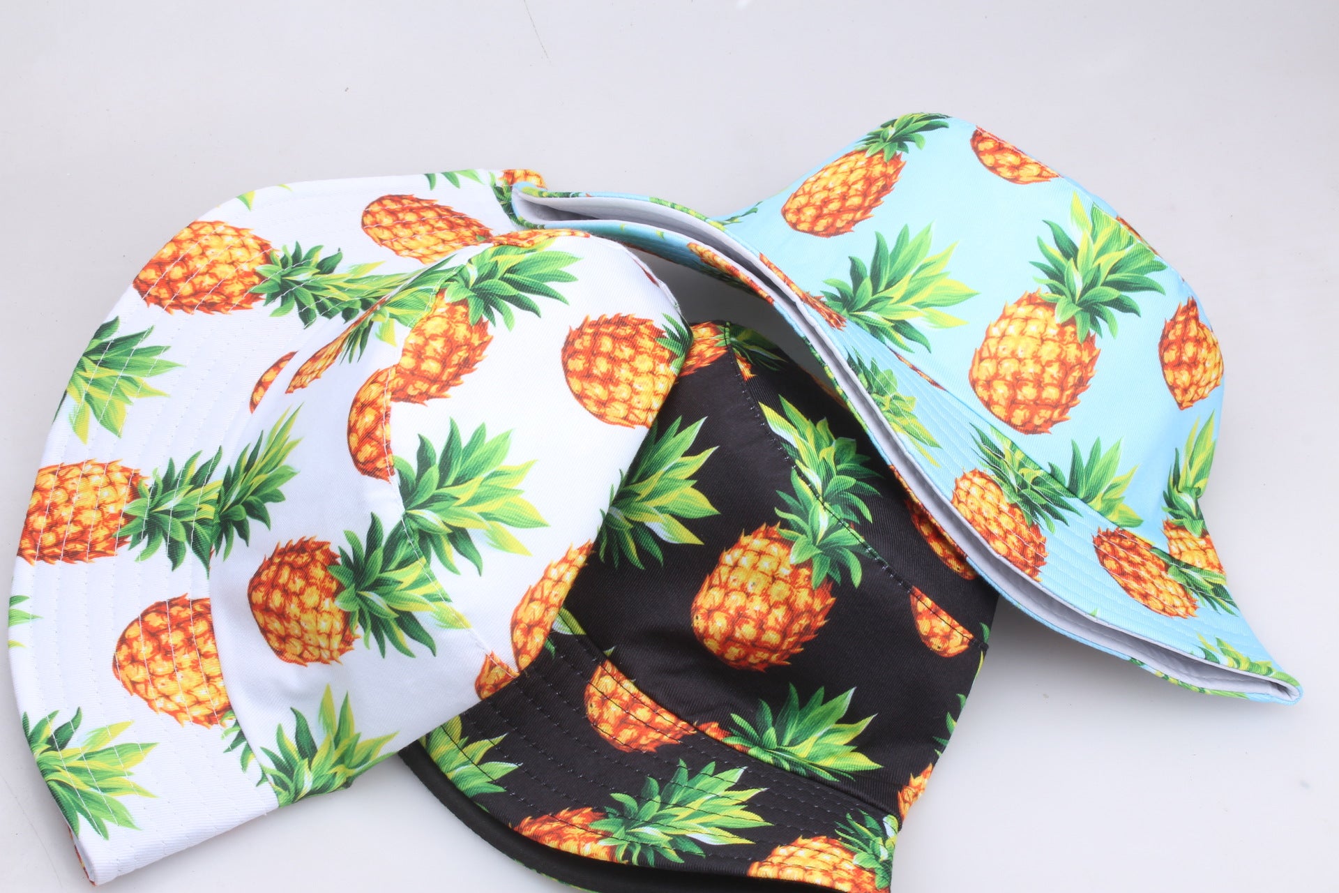 Wholesale Sun Protection Double-sided Pineapple Print Bucket Hat