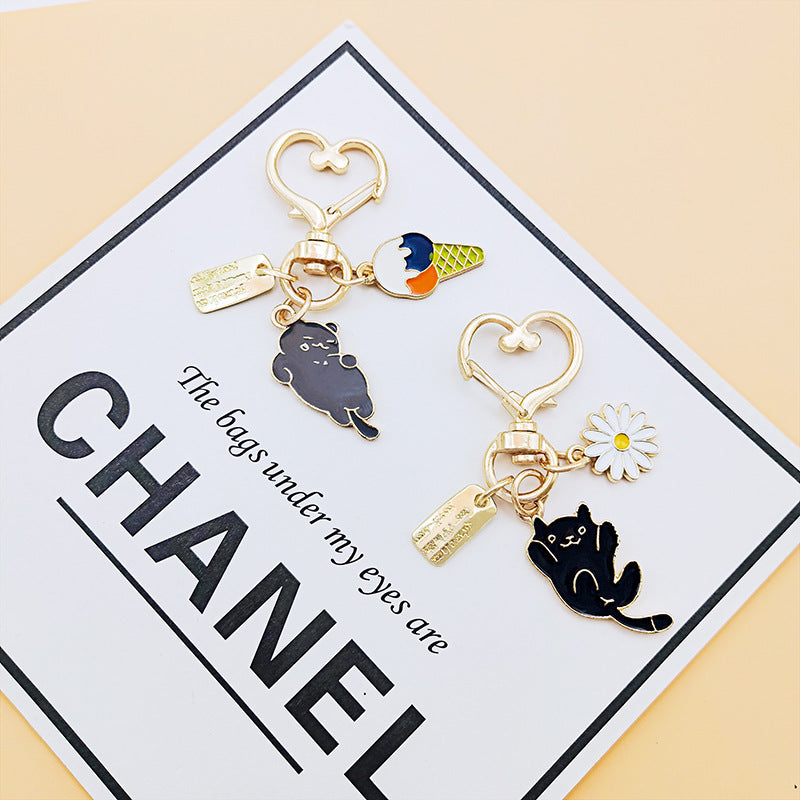 Llavero de flores de gatito de aleación de zinc al por mayor