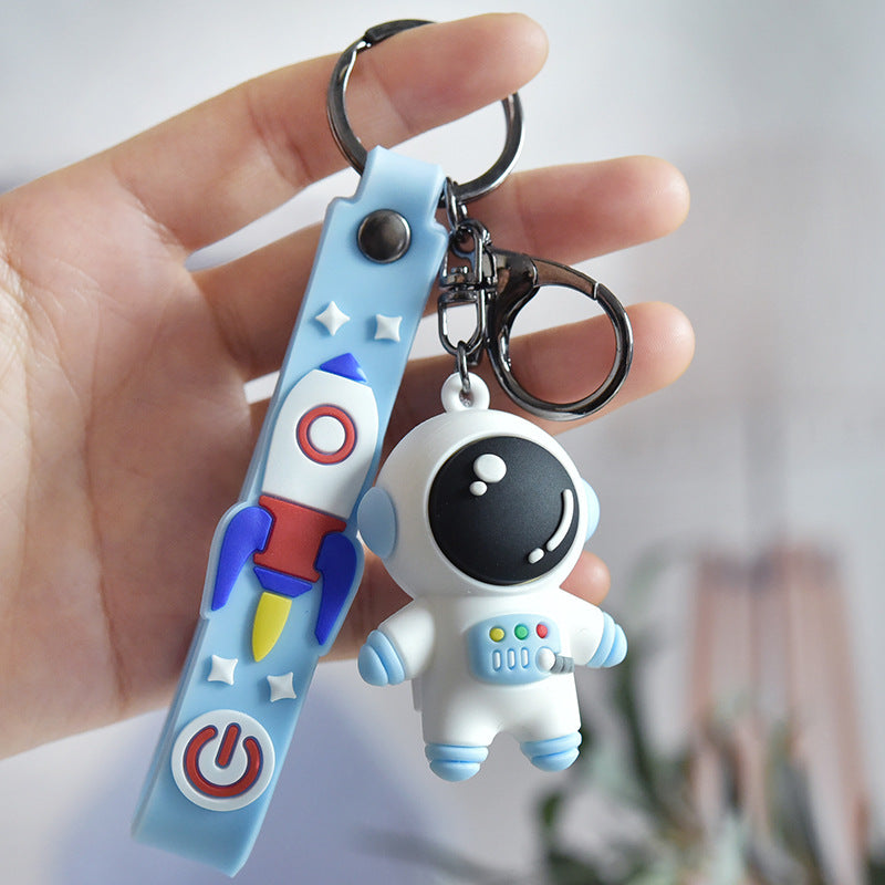 Caricatura de astronauta al por mayor llaves de goma suave