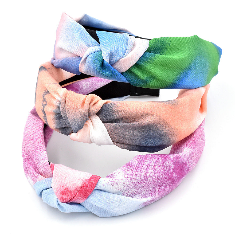 Wholesale of New Rainbow Ink Knotted Fabric Headband