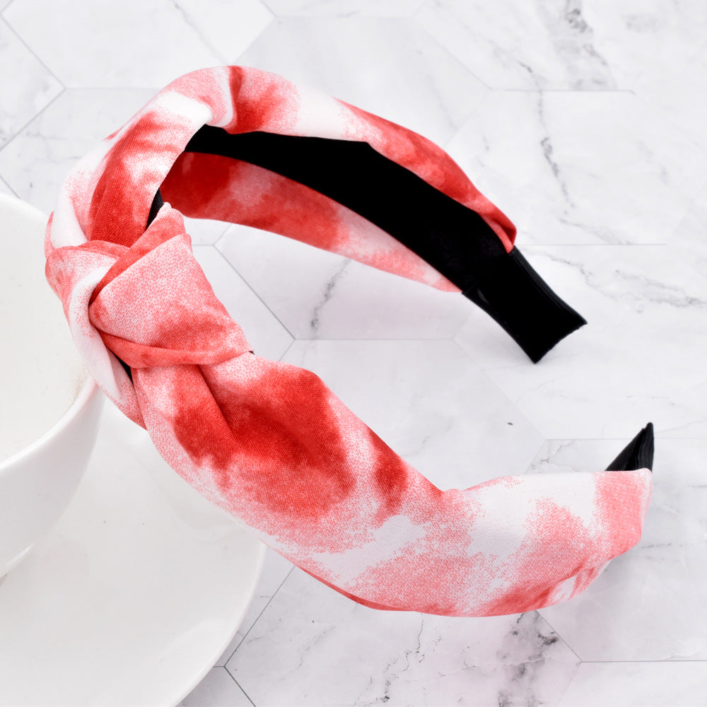 Wholesale of New Rainbow Ink Knotted Fabric Headband