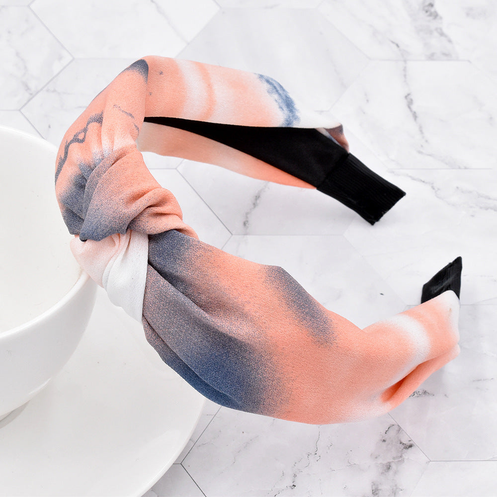 Wholesale of New Rainbow Ink Knotted Fabric Headband