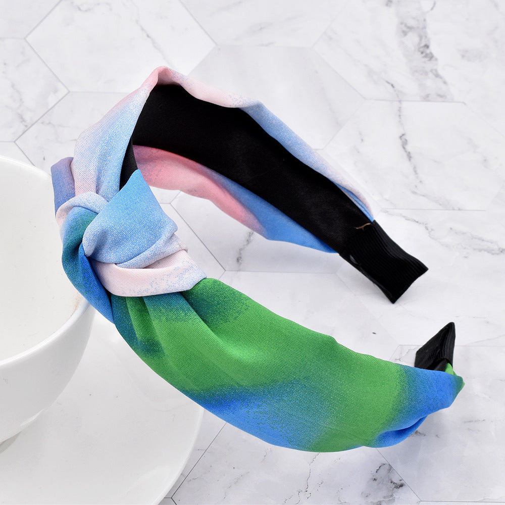Wholesale of New Rainbow Ink Knotted Fabric Headband