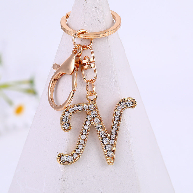 Aleación de zinc al por mayor 26 Inglés Alphabet Rhinestone Keychain
