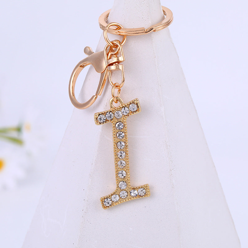 Aleación de zinc al por mayor 26 Inglés Alphabet Rhinestone Keychain
