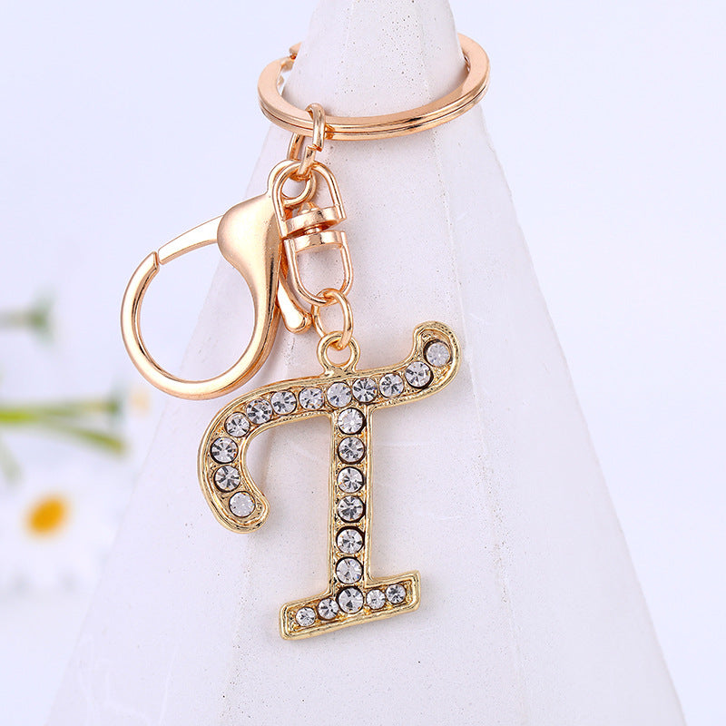 Aleación de zinc al por mayor 26 Inglés Alphabet Rhinestone Keychain