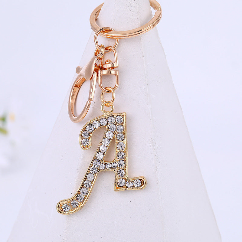 Aleación de zinc al por mayor 26 Inglés Alphabet Rhinestone Keychain