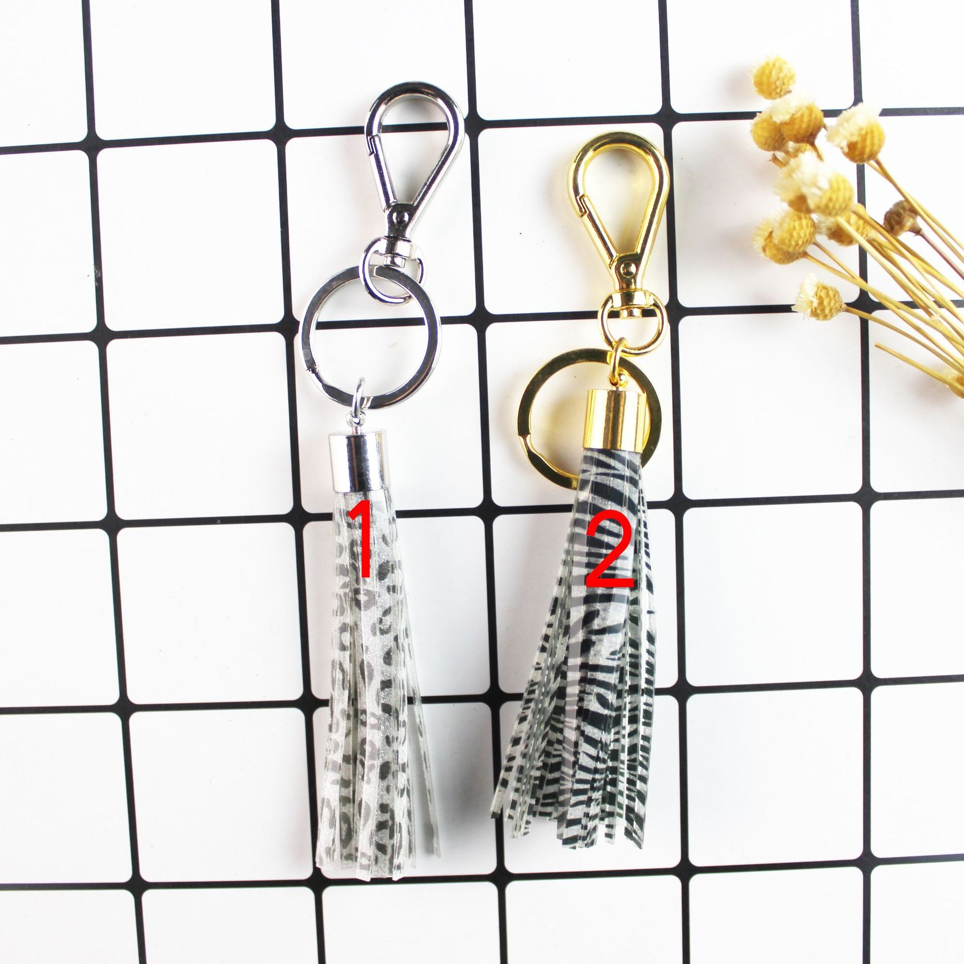 Wholesale Night Luminous Tassel Leather Keychains