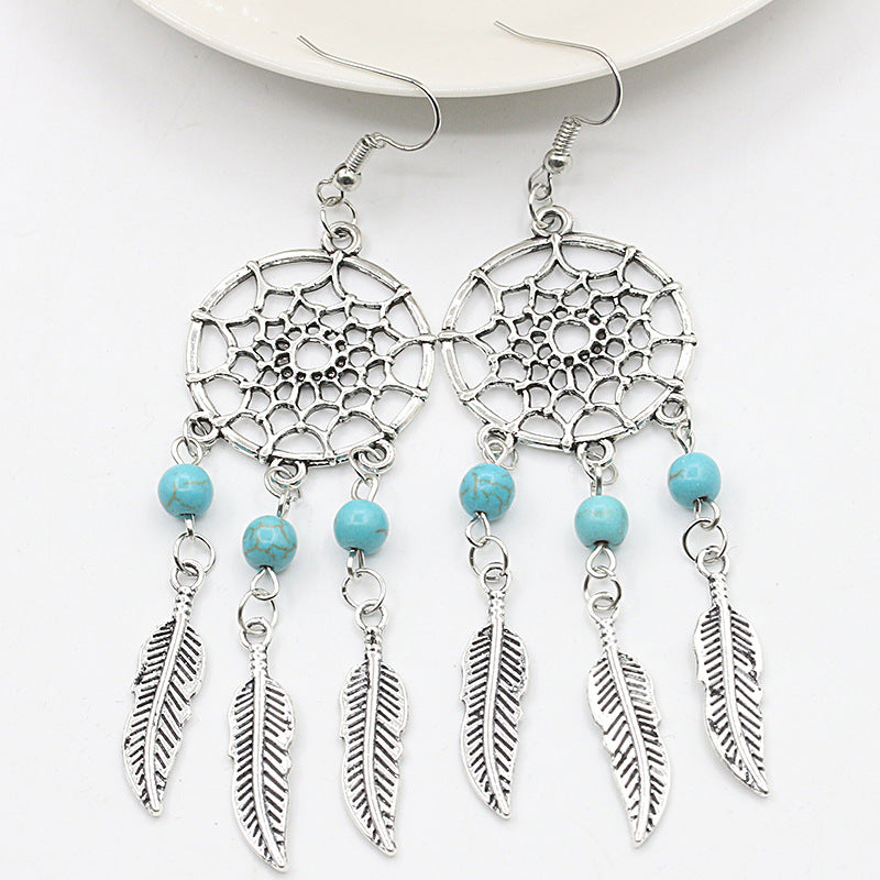 Wholesale Feather Earrings Pumeng Net Alloy Earrings