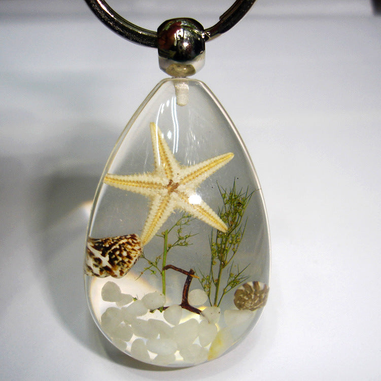 Wholesale 12pcs Natural Starfish Amber Keychain