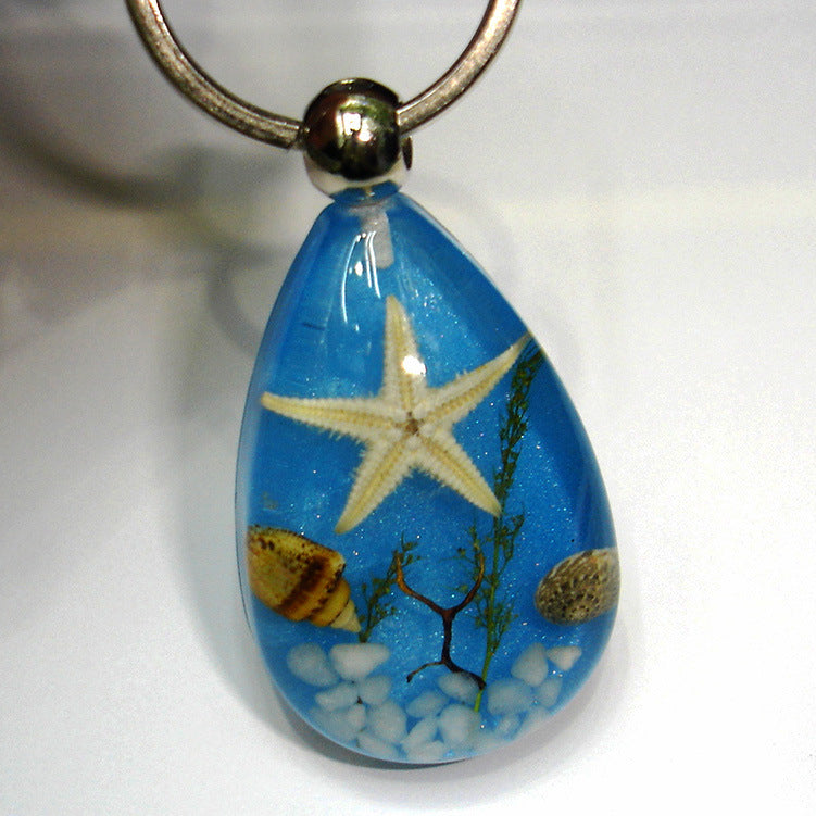 Wholesale 12pcs Natural Starfish Amber Keychain