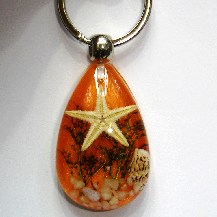 Wholesale 12pcs Natural Starfish Amber Keychain