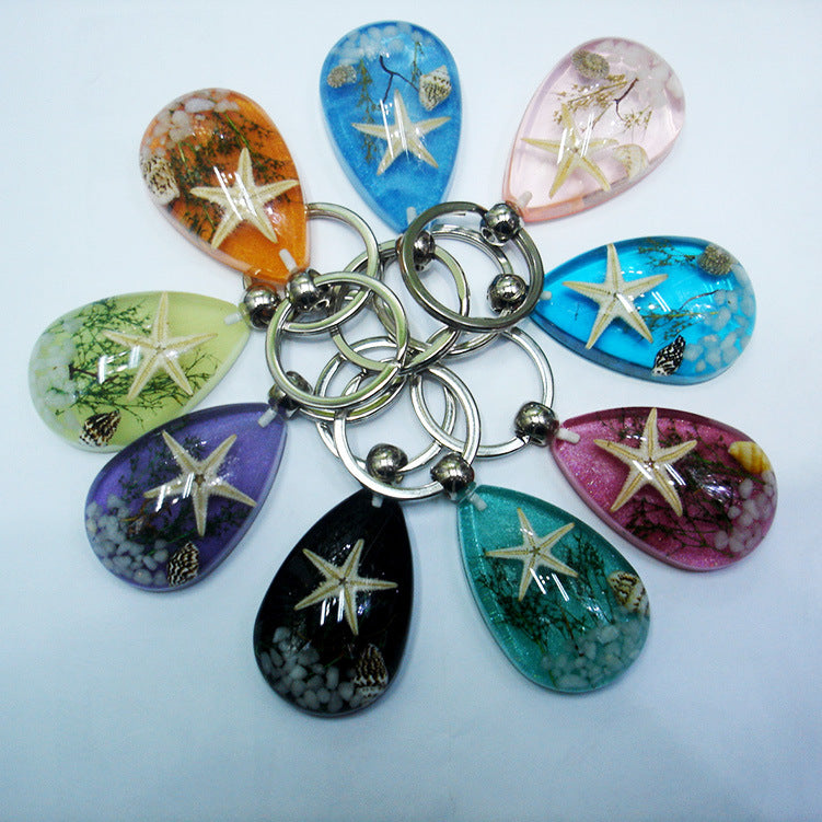 Wholesale 12pcs Natural Starfish Amber Keychain