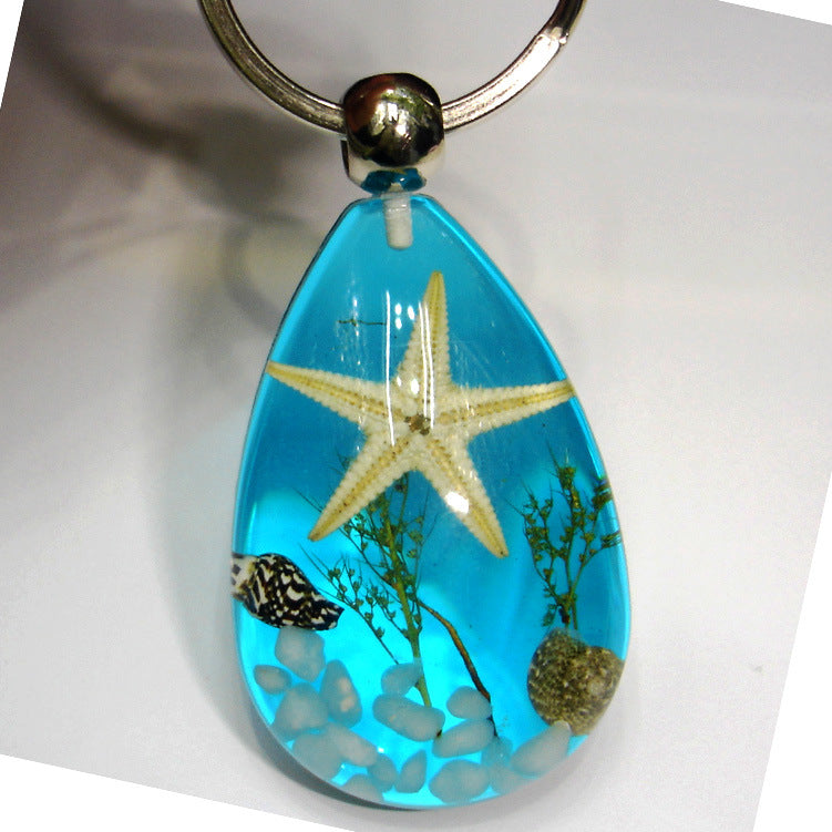 Wholesale 12pcs Natural Starfish Amber Keychain