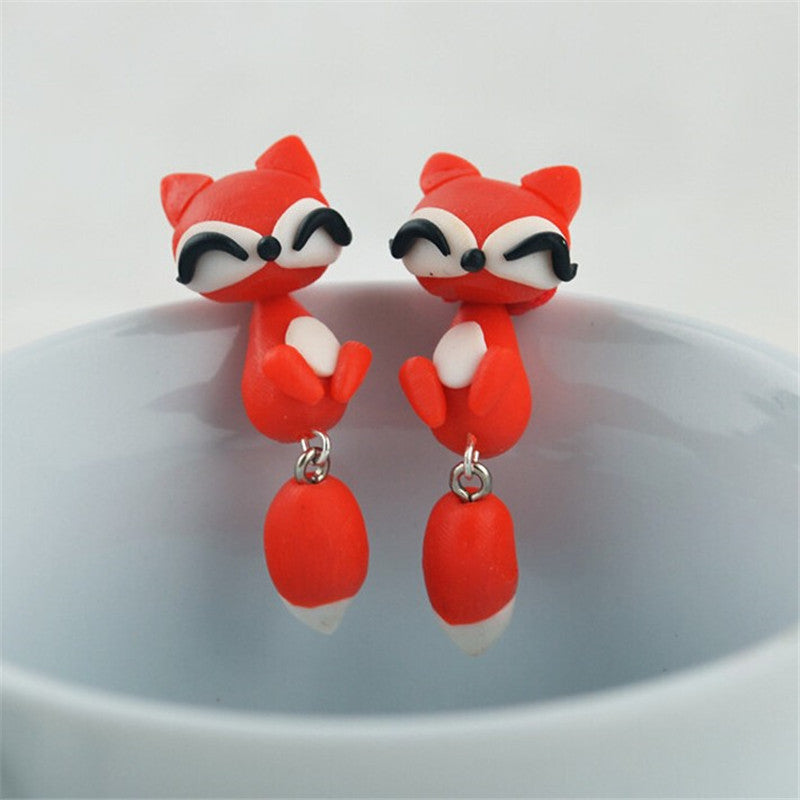 Pendientes de arcilla de cerámica suaves de los animales lindos al por mayor