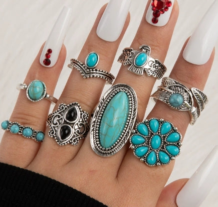 Vintage 8-piece Ring Set with Turquoise Carved Feathers