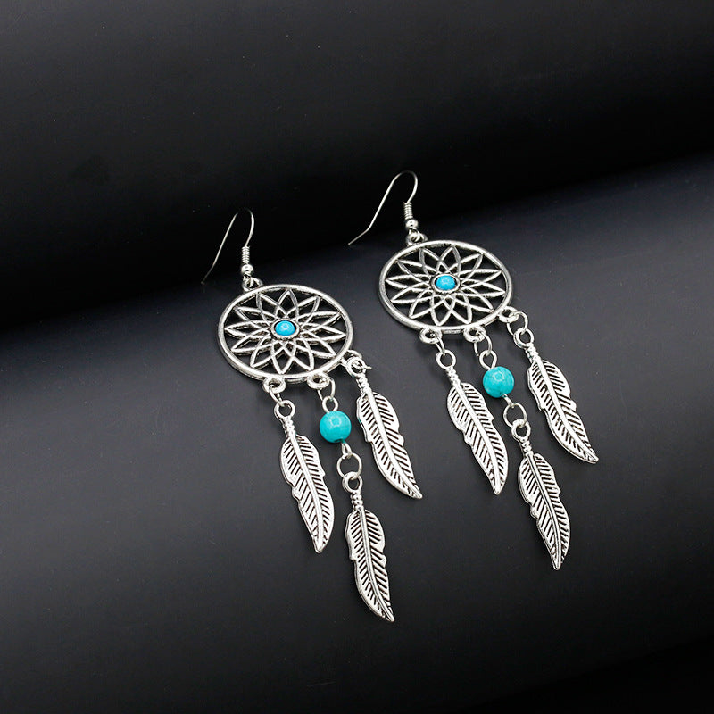Wholesale Feather Earrings Pumeng Net Alloy Earrings