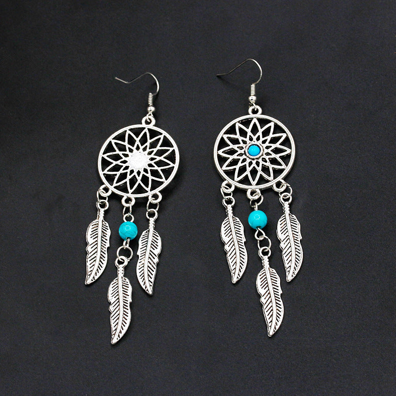Wholesale Feather Earrings Pumeng Net Alloy Earrings