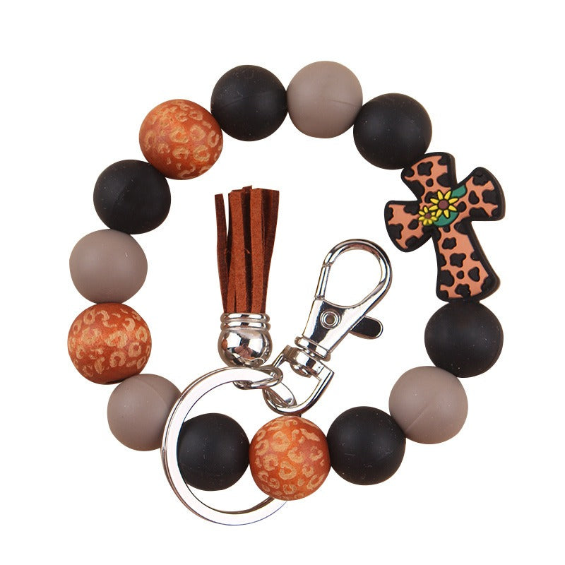Wholesale Silicone Leather Wooden Beads Tassel Print Leopard Bracelet Keychain