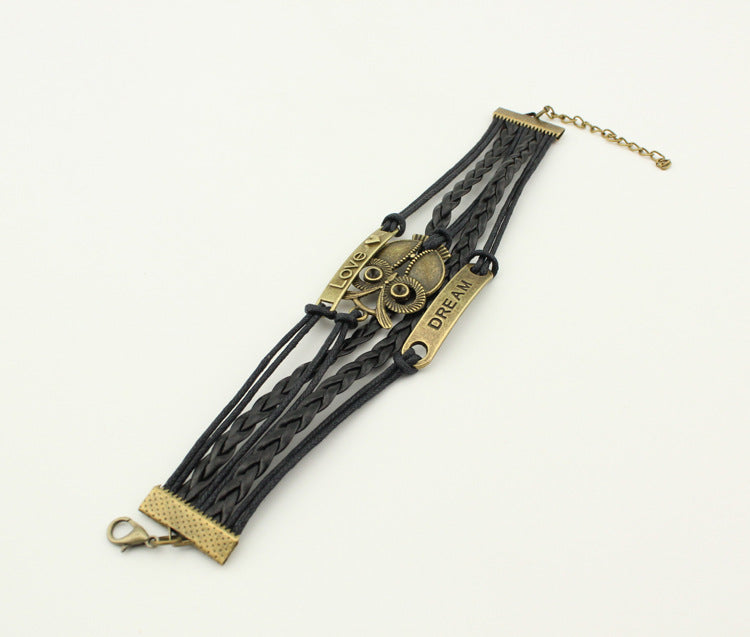 Accesorios de cuerda de cuero múltiples al por mayor Brazalete de búho con ojos grandes trenzados