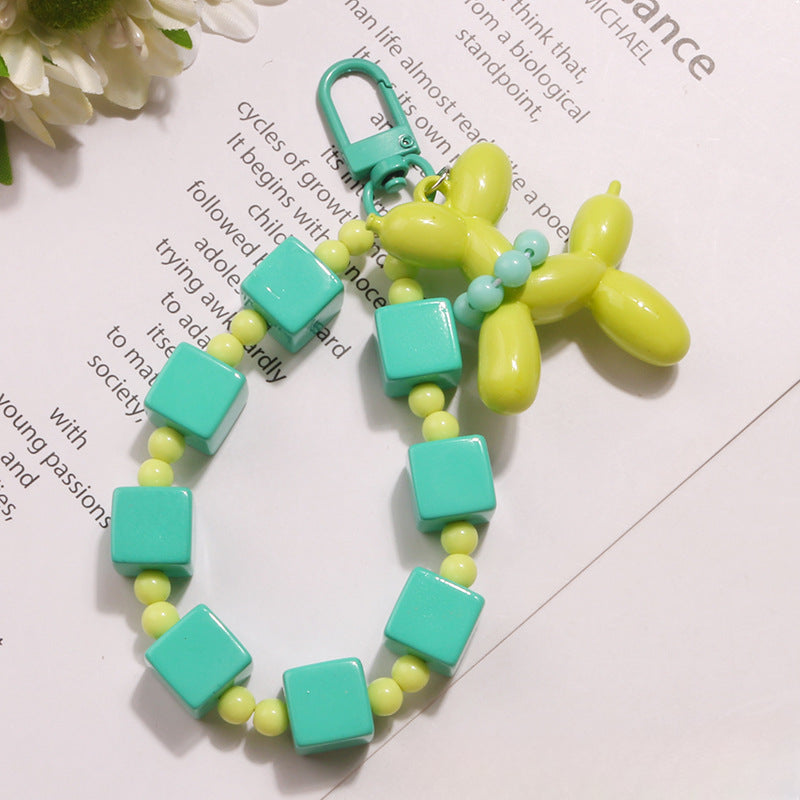 Wholesale Acrylic Rice Beads Bubble Dog Doll Keychain