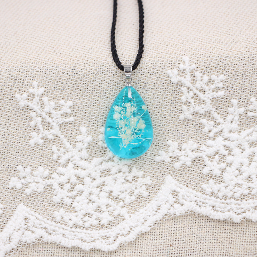 Wholesale Handmade Resin Pendant Necklace With Dried Flowers Blue Glow In The Dark Nature Design Boutique Jewelry Accessory