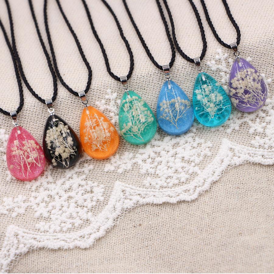 Wholesale Handmade Resin Pendant Necklace With Dried Flowers Blue Glow In The Dark Nature Design Boutique Jewelry Accessory