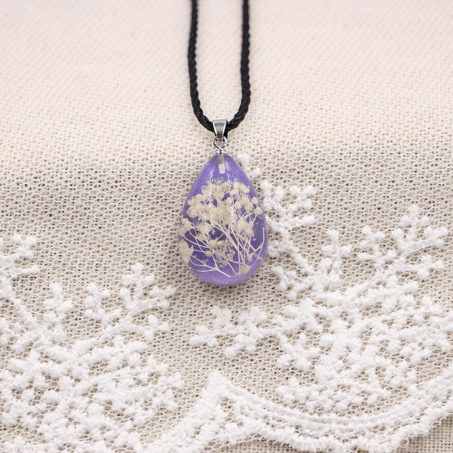 Wholesale Handmade Resin Pendant Necklace With Dried Flowers Blue Glow In The Dark Nature Design Boutique Jewelry Accessory