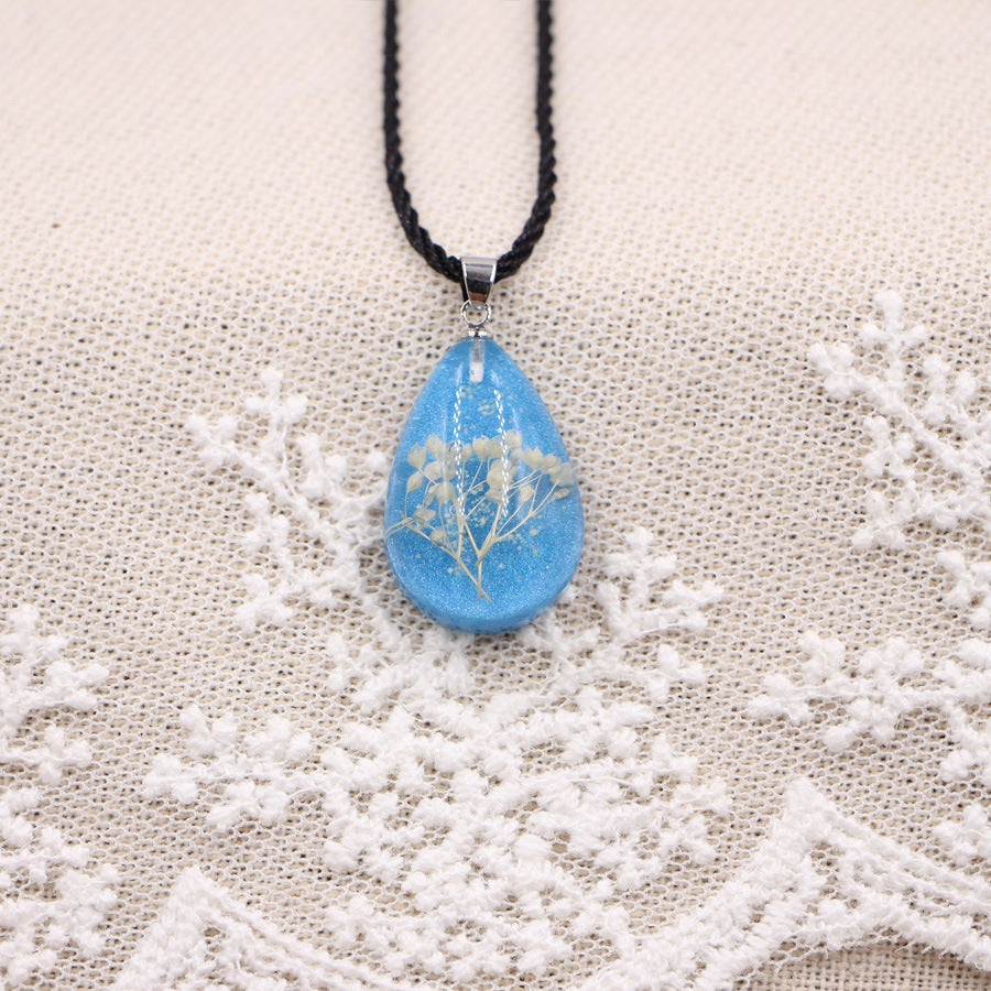 Wholesale Handmade Resin Pendant Necklace With Dried Flowers Blue Glow In The Dark Nature Design Boutique Jewelry Accessory