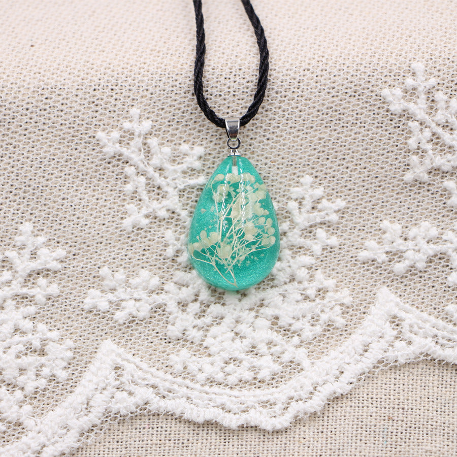 Wholesale Handmade Resin Pendant Necklace With Dried Flowers Blue Glow In The Dark Nature Design Boutique Jewelry Accessory