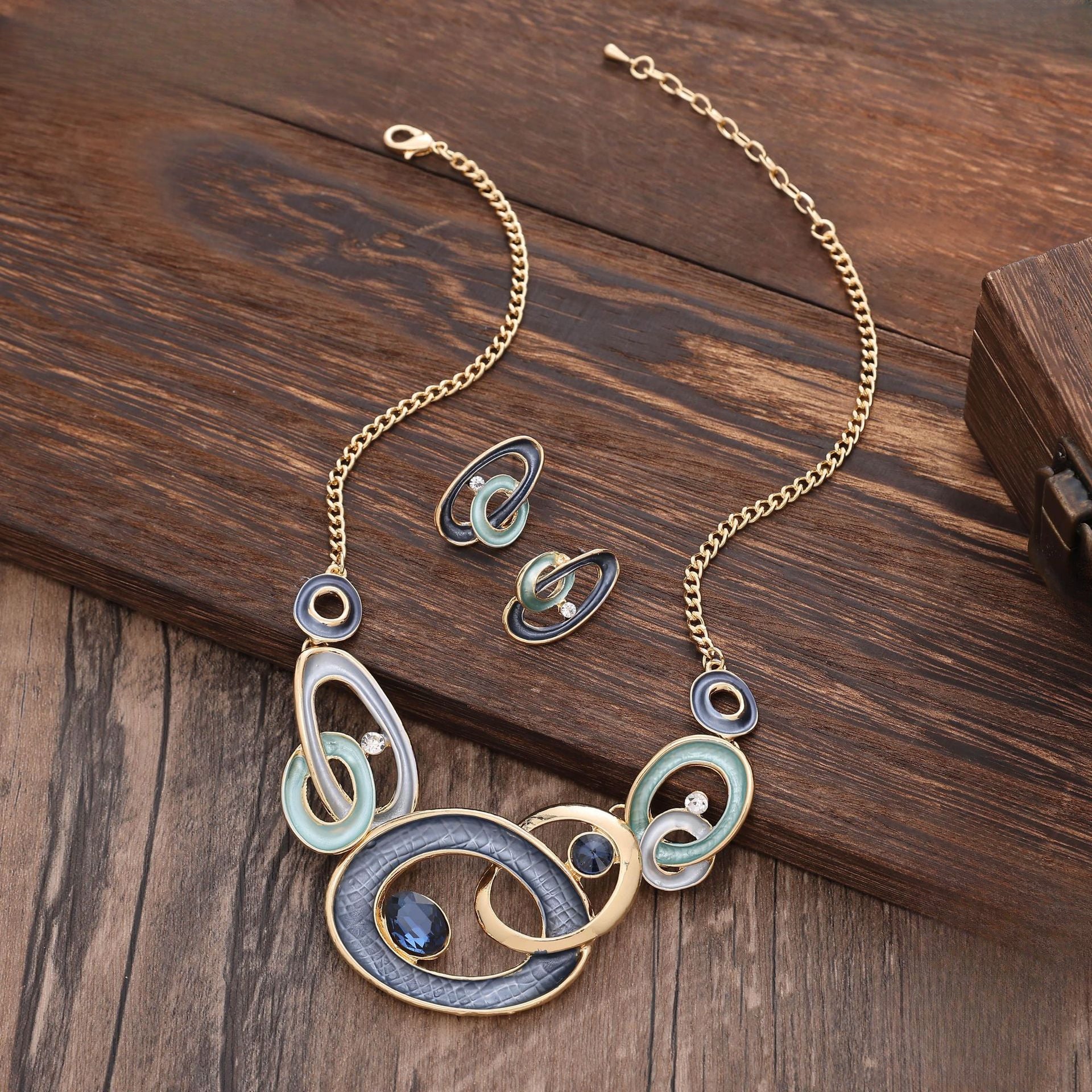 Wholesale 2pcs Popular Color Painting Oil Geometric Hollow Round Stud Earring Necklace Set