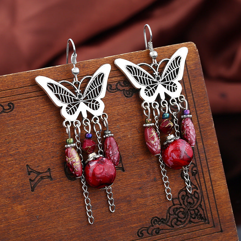 Wholesale retro hollow butterfly tassel earrings