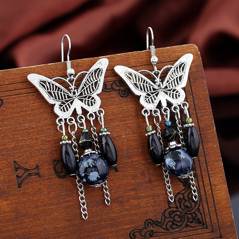 Wholesale retro hollow butterfly tassel earrings