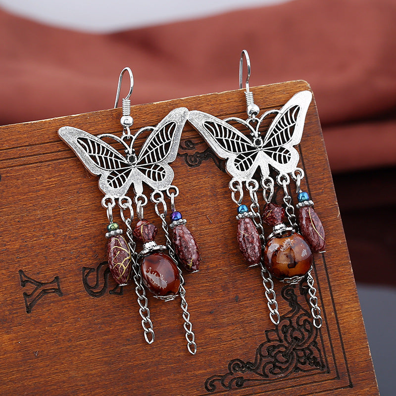 Wholesale retro hollow butterfly tassel earrings