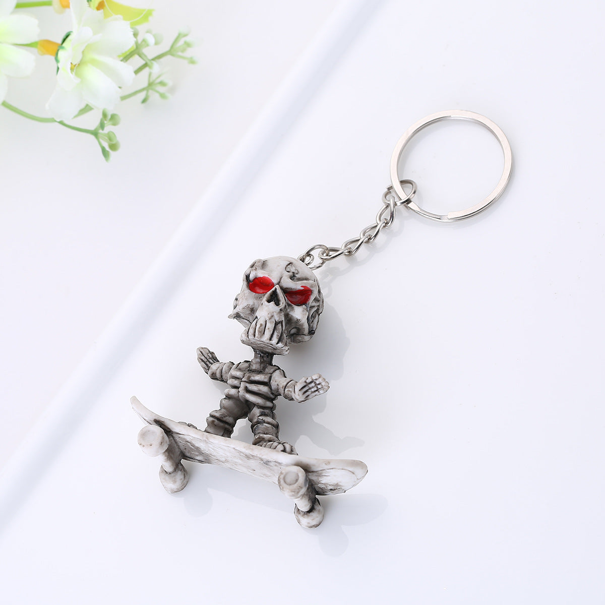 Wholesale Chic Rubber Skull Skateboard Keychain Grey Fashion Accessory For Promotional Gift