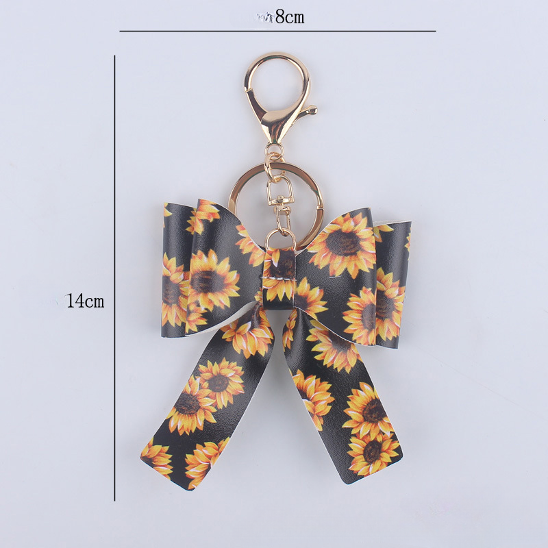 Wholesale Cartoon Aztec Color Bow Leather Keychain