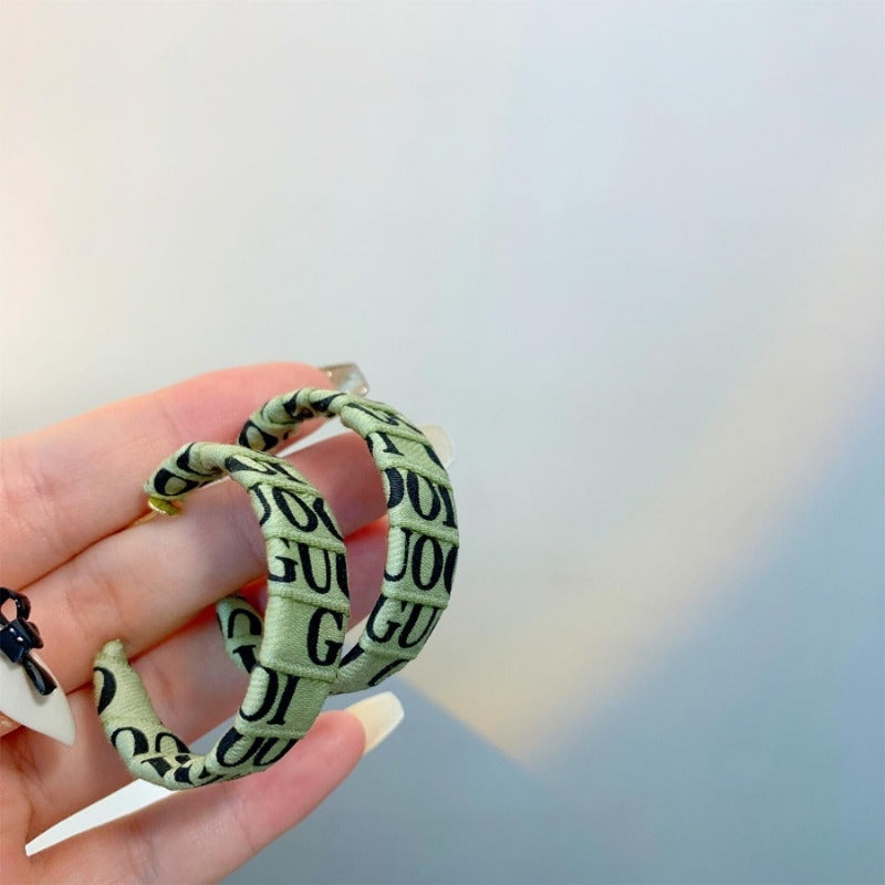 Wholesale S925 Silver Needle Versatile Letter Stripe Cold Wind Leather Earrings