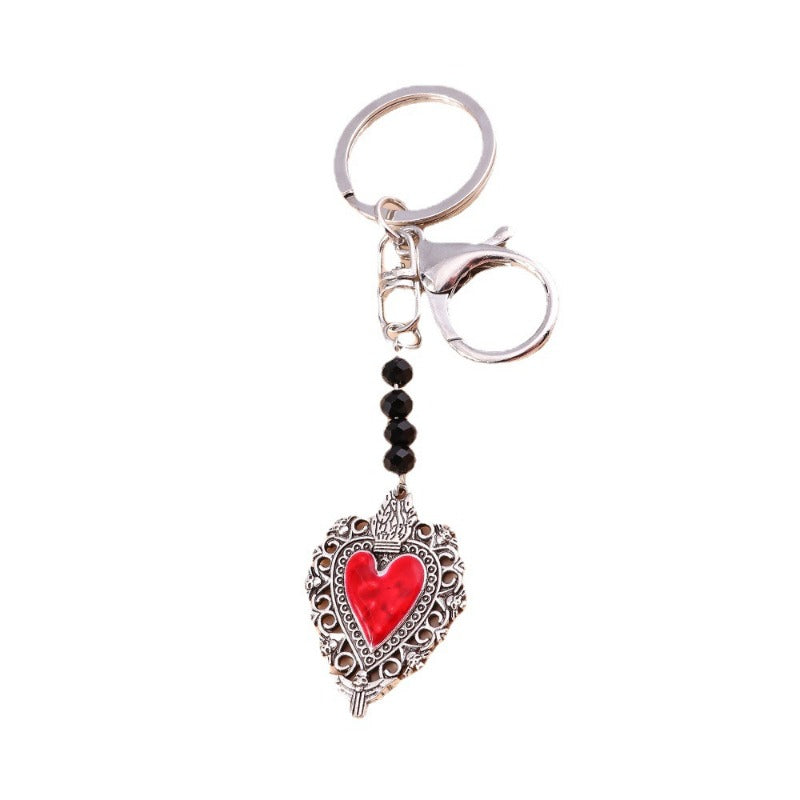 Wholesale Butterfly Cross Hollow Lace Love Devil Eyes Keychain