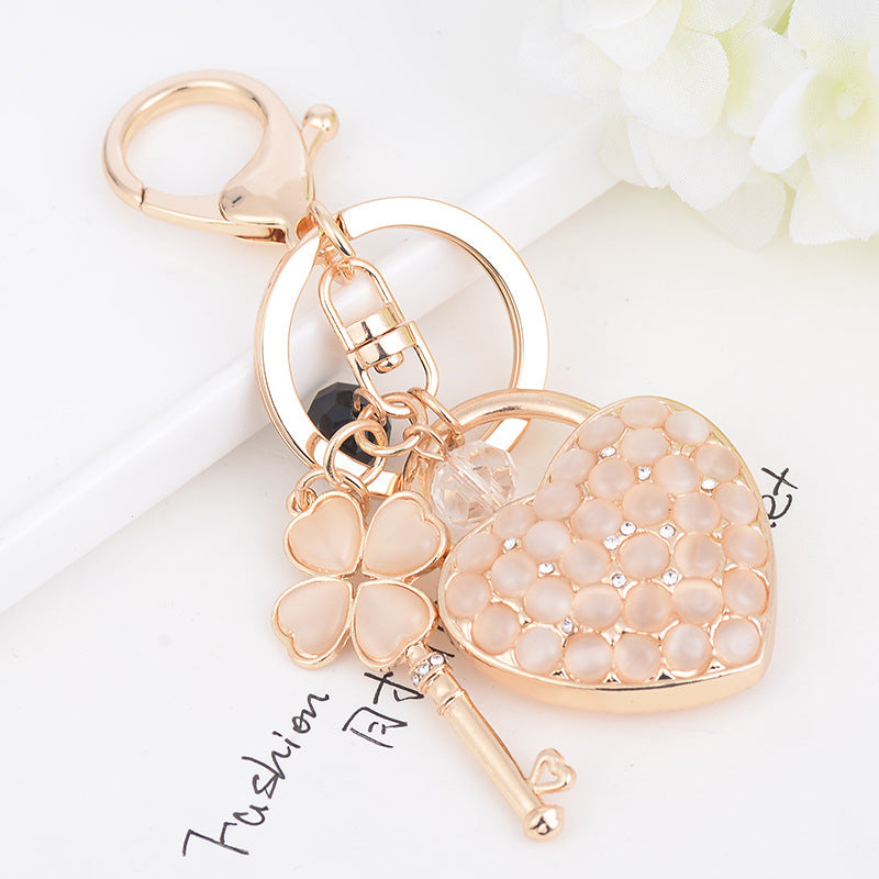 Wholesale Diamond studded Cat' s Eye Heart Keychain Pendant