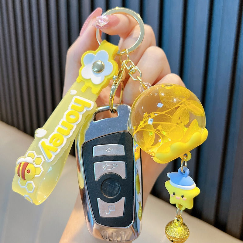 Wholesale Dried Flowers in Oil Wind Chime Liquid Quicksand Pendant Keychain