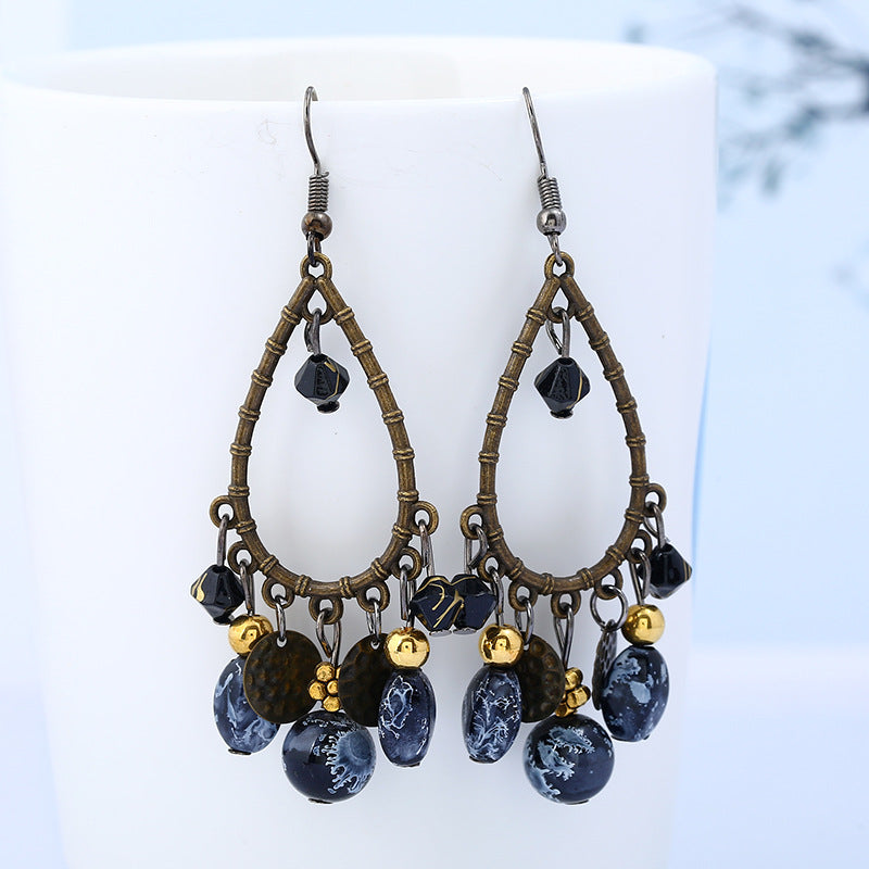 Wholesale Fashionable ethnic retro hollow water drop beaded tassel earrings