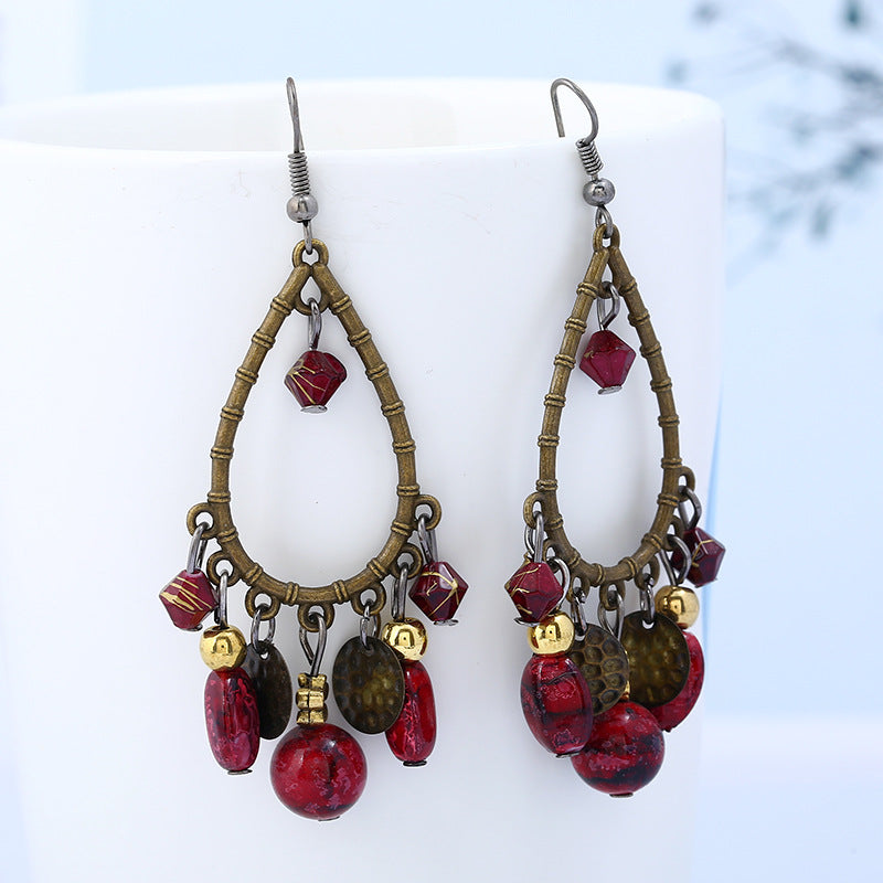 Wholesale Fashionable ethnic retro hollow water drop beaded tassel earrings