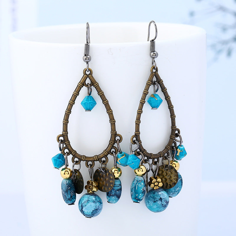 Wholesale Fashionable ethnic retro hollow water drop beaded tassel earrings