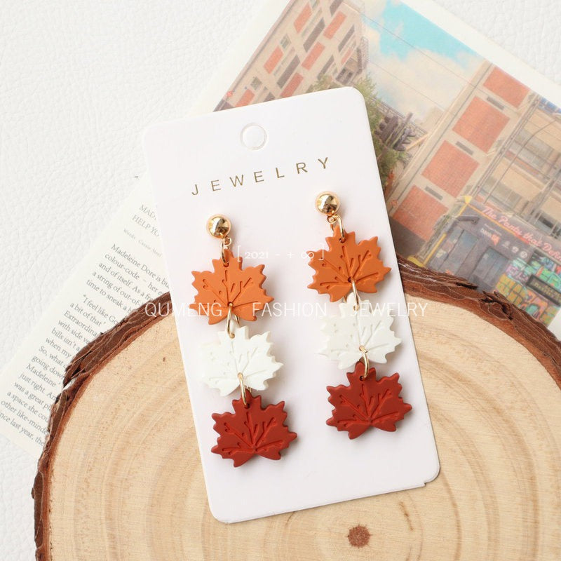Wholesale Imitation Soft Pottery Hand Feel Spray Painted Acrylic Cat Maple Leaf Earrings