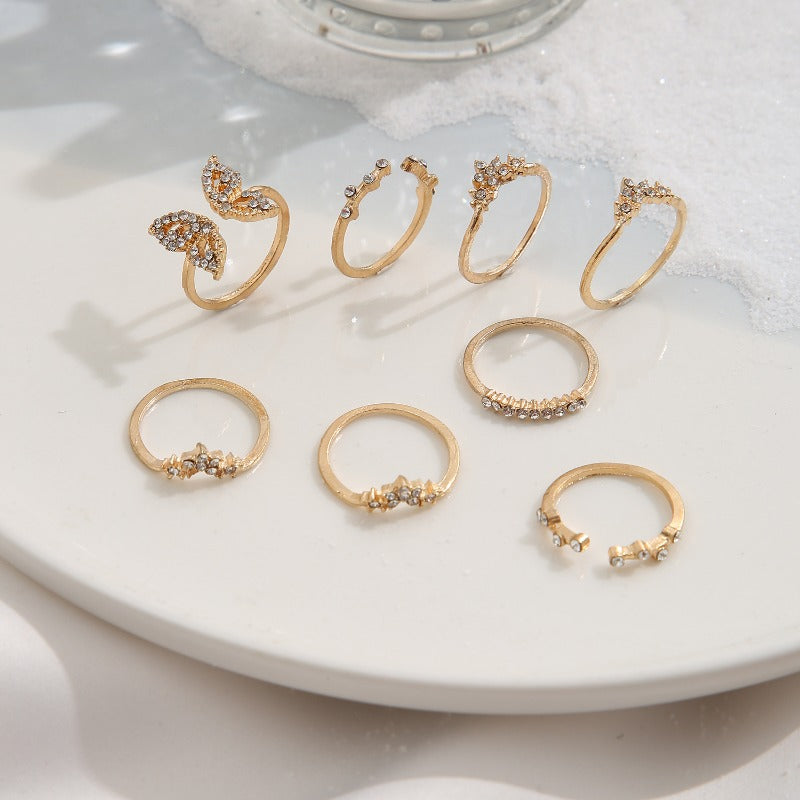 Wholesale of 8-piece Alloy Set with Full Diamond Butterfly Opening Rings