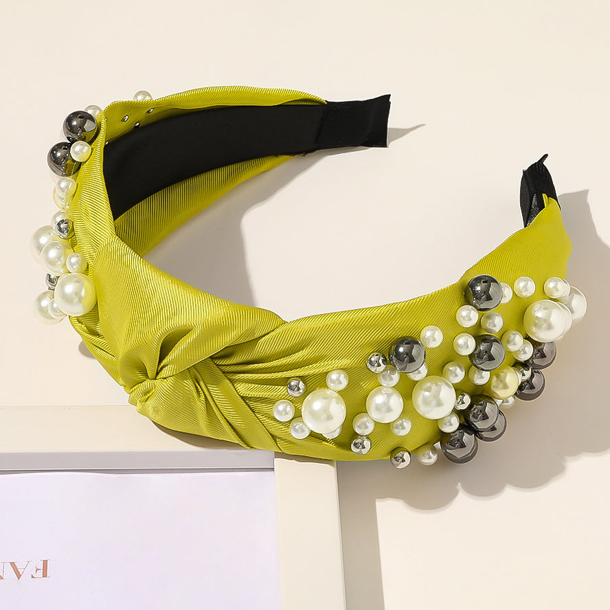 Wholesale of New Pearl Knotted Wide Edged PU Hair Bands