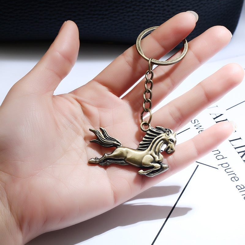Llavero de águila voladora de pony de aleación al por mayor