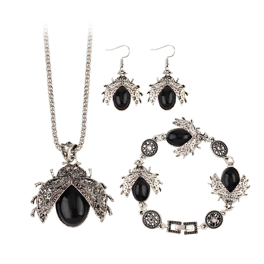 Wholesale Seven Star Ladybug Three Piece Alloy Earrings